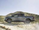 Side view of grey Ridgeline on desert hills.